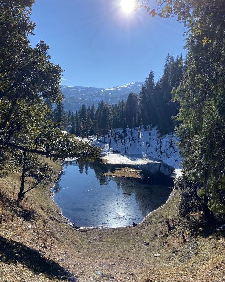 Tents pitched in deep snow at base camp
